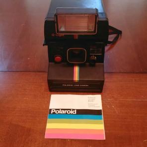 Q-Light One Step Plus Polaroid Camera