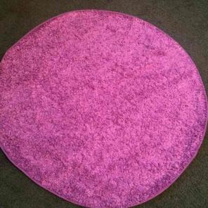 Super cute round fuzzy purple throw rug