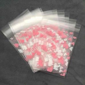 24 pink hearts frosted seal cello bags