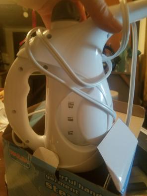 Handheld fabric garment steamer