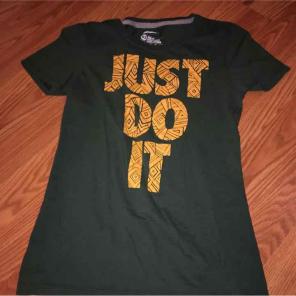 Green and yellow Nike tshirt
