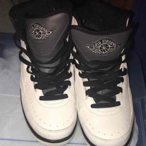White and grey Jordan basketball sneaker