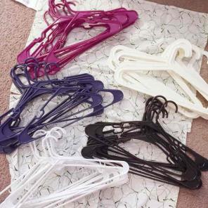 50 regular sized plastic hangers lot
