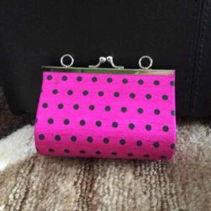 Pink and black polka dot clutch purse