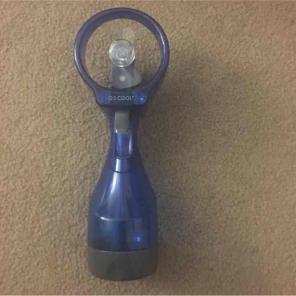 Portable fan with misting spray