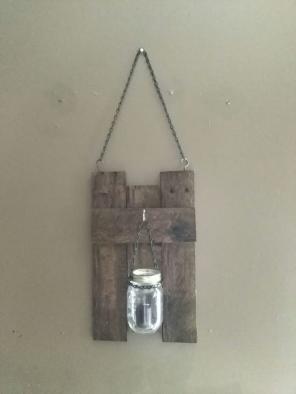 Homemade candle holder wall art