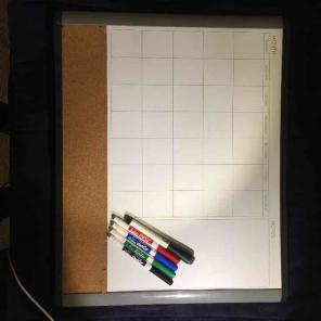 White board with 4 pens