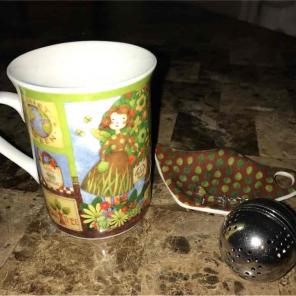 Tea mug, diffuser and spoon rest
