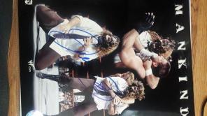 Signed picture of wwe legend Mick foley
