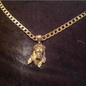 Cuban link with Jesus piece