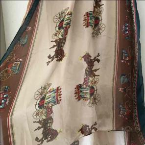Scarf with horse carriage design