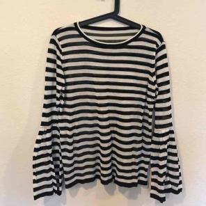 Black and white striped bell sleeve top