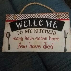 Cute and funny kitchen sign.