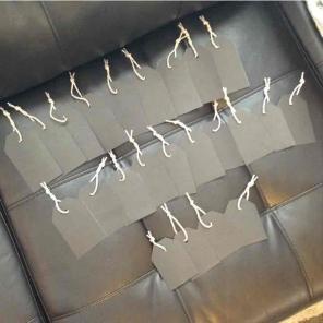23 black textured tags
