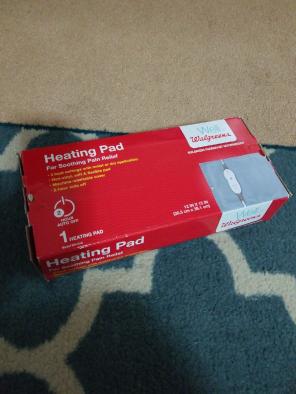 Heating pad for soothing pain relief