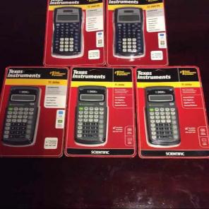 Five Texas Instruments calculators new
