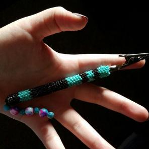 Beaded roach clip.