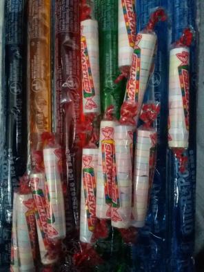 15 Popsicles and 30 rolls of candy