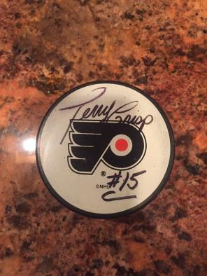 Terry Grisp Hockey Puck