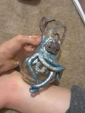 Masked Octopus/Deer on Antique Vase.