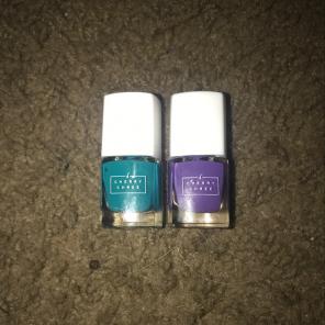 team and purple nail polishes