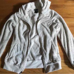 women's white North Face jacket