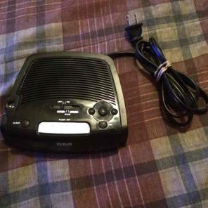 Mini radio with alarm clock