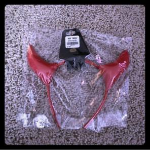 Red devil horns.