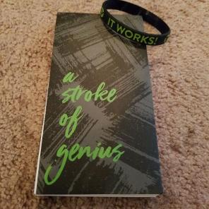 It Works bracelet and notebook