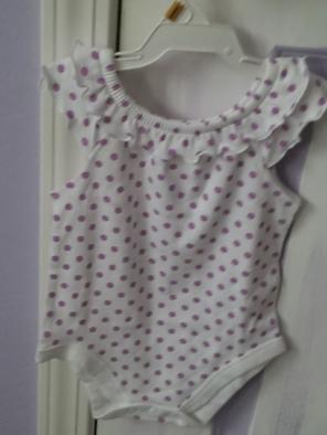 Very cute baby girl onesie with shorts.