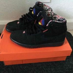 Black and red Nike Jordan's