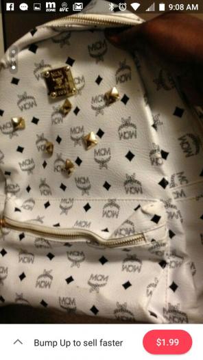 White and gold MCM booksack