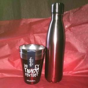 Stainless liquor and cup set.