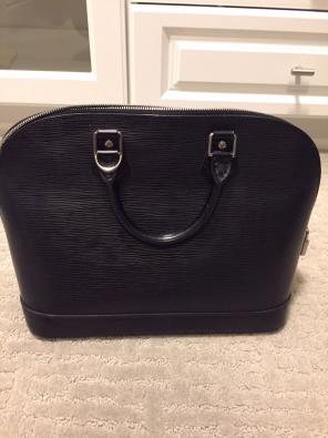 Louis Vuitton Alma Bag.