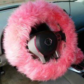 Pink furry steering wheel cover