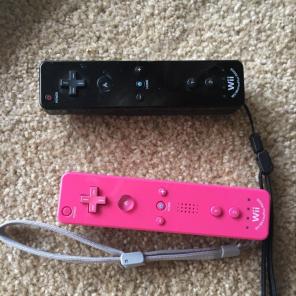 Pink And Black Wii Remotes