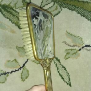 Vintage mirror and brush in one