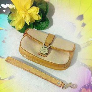 Dooney & Bourke Pink Push Lock Wristlet