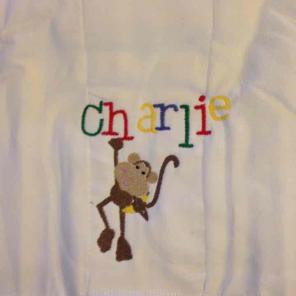 Hanging monkey burp cloth. FIRM PRICING.