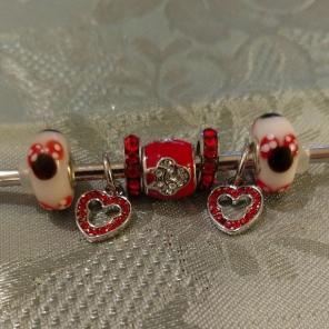 Euro Minnie bead charm set of 7.