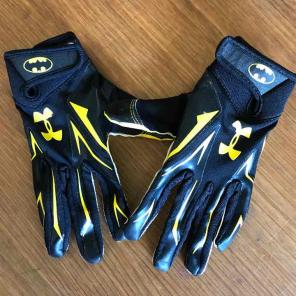 UA boys football gloves