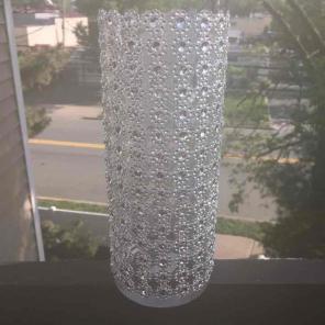 Tall cylinder with a flare of bling