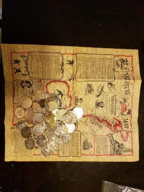 Treasure map and gold doubloons
