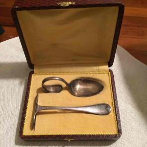 Vintage child's spoon and pusher set