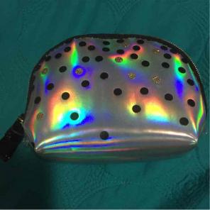 Holographic pouch with bracelet