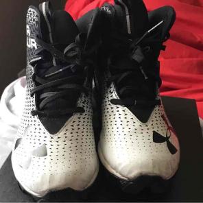 Under Armour cleats black and white