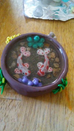 Koi fish pond/ coral disgned on side