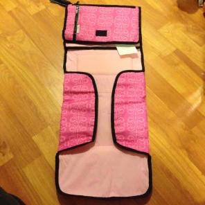 Munchkin pink changing station