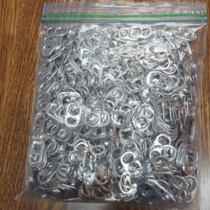 Bag of pop Tabs soda tops