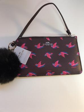 Coach Wristlet w/ Pom Pom (collectiable)